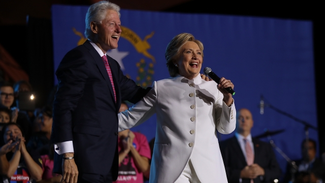 Hillary Clinton and Bill Clinton standing together