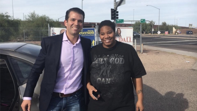 Donald Trump Jr. and the stranded motorist he helped in Arizona pose for a photo