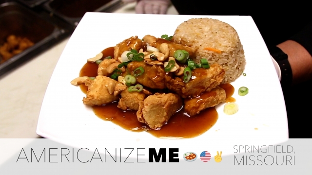 cashew chicken on a square plate
