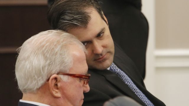 Former North Charleston Police Officer Michael Slager (R) sits in the courtroom, October 28, 2016 in Charleston, SC.
