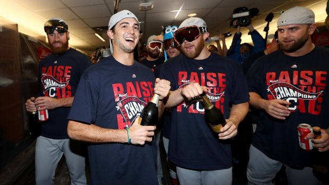 Indians celebrate in shirts after ALCS win