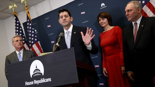 House Speaker Paul Ryan speaks at a lectern