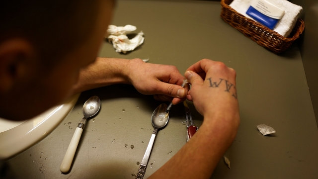 Man preparing to use heroin