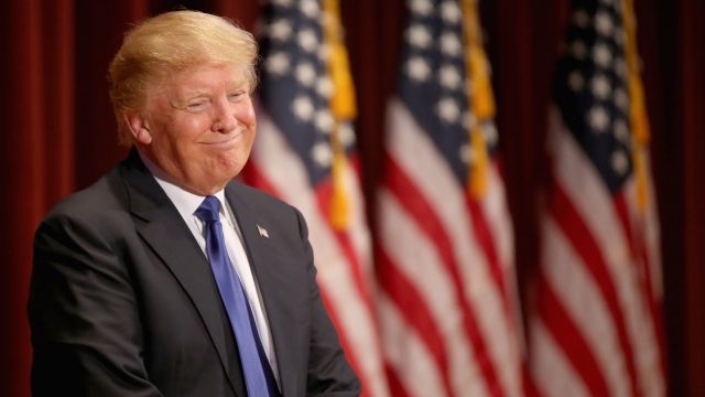 President-elect Donald Trump smiles as he speaks to veterans.