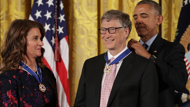 President Obama gives the Presidential Medal of Freedom to Bill and Melinda Gates.