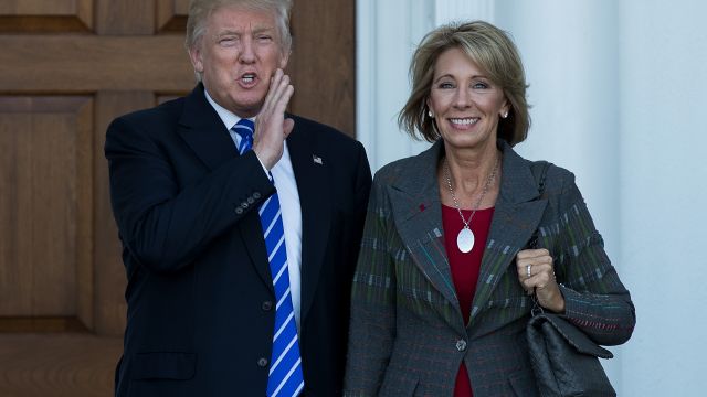 President-elect Donald Trump with Betsy DeVos
