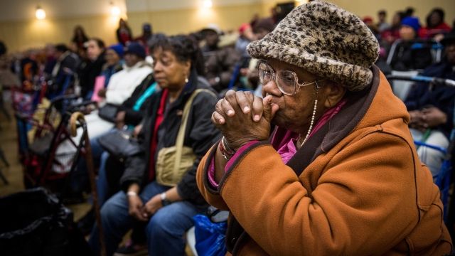 Those in need wait for meals on Thanksgiving day