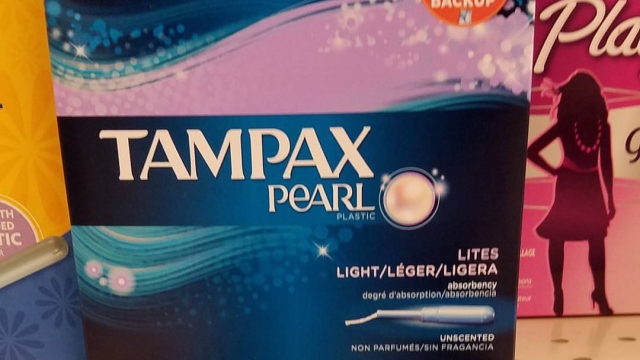 Box of tampons on store shelf