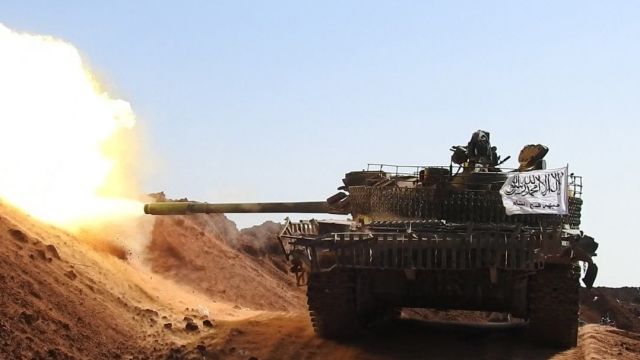 A Jabhat al-Nusra, who now call themselves Jabhat Fatah al-Sham, tank fires during an offensive on Aleppo in Syria.