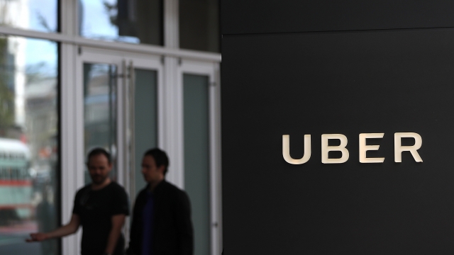 The logo of the ride sharing service Uber is seen in front of its headquarters