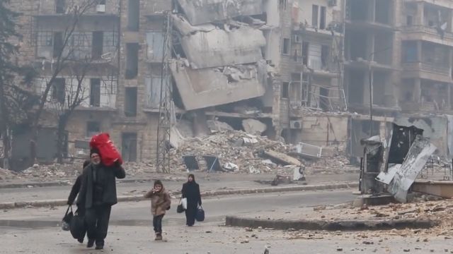 People leaving east Aleppo, Syria
