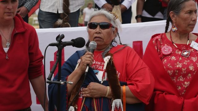 Faith Spotted Eagle speaks at an event