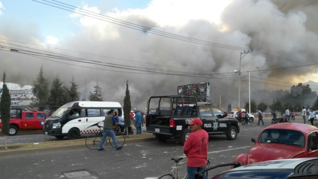 Smoke rises above an explosion in Mexico