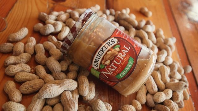 A jar of Smucker's Natural peanut butter is pictured.