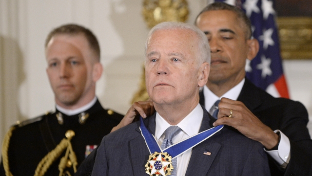 President Obama puts medal on Vice President Biden