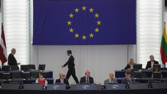 A man walks through the European Parliament