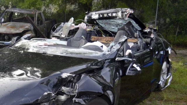 Crashed Tesla S Type car