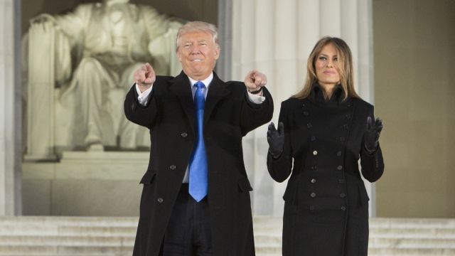 President-elect Donald J. Trump and wife Melania Trump gesturing at Lincoln Memorial