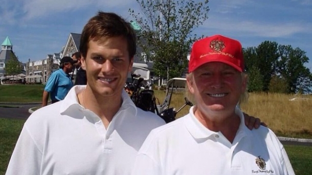 An image of Donald Trump and Tom Brady on a golf course from 2013.
