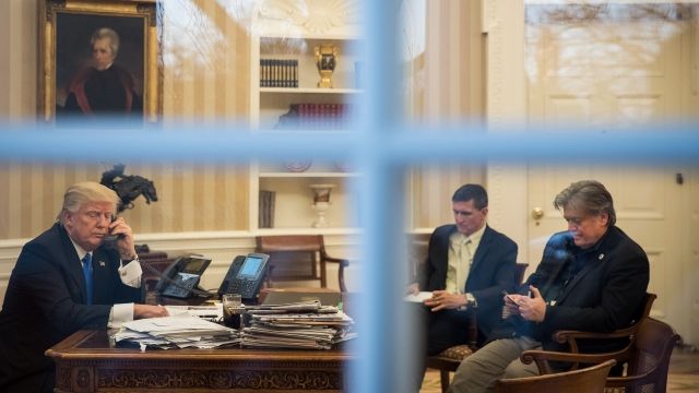 Donald Trump, Michael Flynn and Steve Bannon in the Oval Office