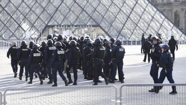 Police outside Louvre after machete-wielding attacker shot