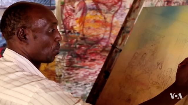 A Kenyan artist paints a doctor strike