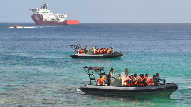 Suspected asylum seekers arrive at Christmas Island.