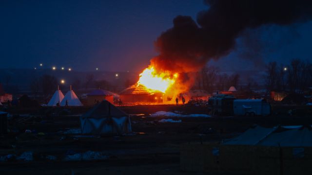A fire at a Standing Rock protest camp