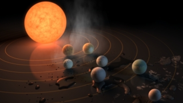 An artist's conception of the planets orbiting TRAPPIST-1.
