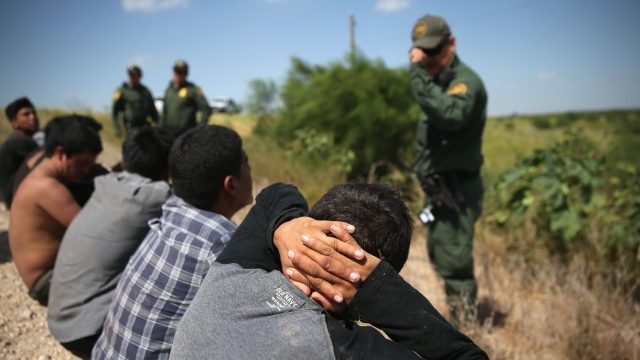 U.S. Border Patrol agents detain undocumented immigrants