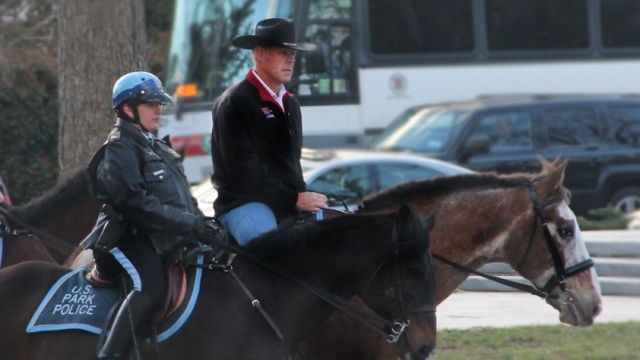 Interior Department Secretary Ryan Zinke riding a horse.