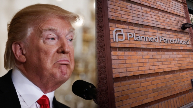 Donald Trump and a Planned Parenthood sign