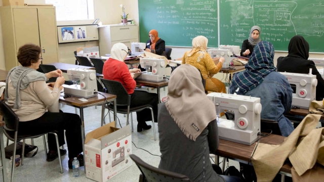 Refugees in a sewing class