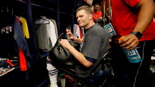 Tom Brady looks for his missing jersey after Super Bowl 51.