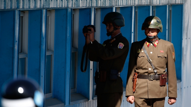 A North Korean soldier take photo as US Ambassador to the UN