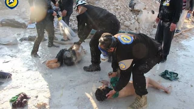 Syria Civil Defense volunteers decontaminate victims from the chemical weapon attack in northern Syria.