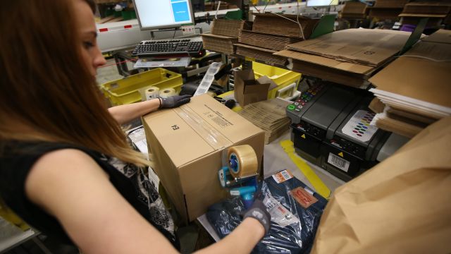 A parcel is prepared for dispatch at an Amazon warehouse