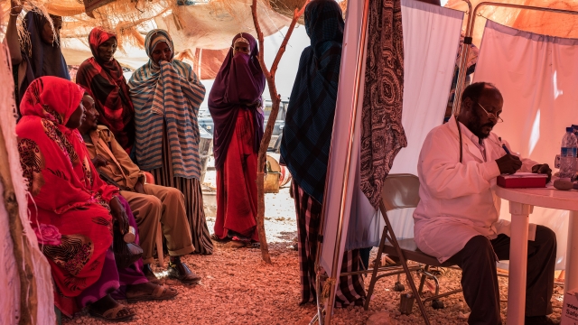 Women wait to see a doctor in Somalia