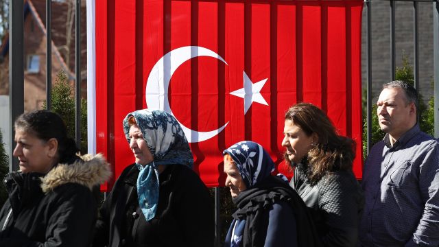 Turks line up to vote in referendum.
