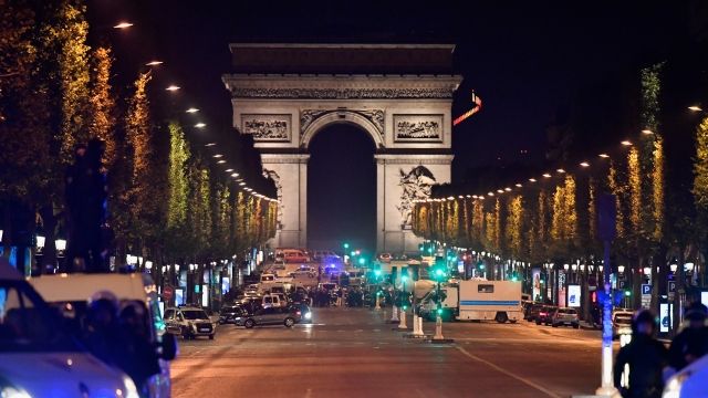 Police cars gather in front of the Champs-Élysées