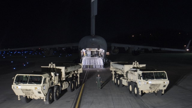 Trucks carry parts to set up the THAAD missile defense system in South Korea.