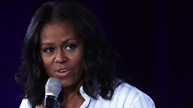 Michelle Obama speaks at a conference.