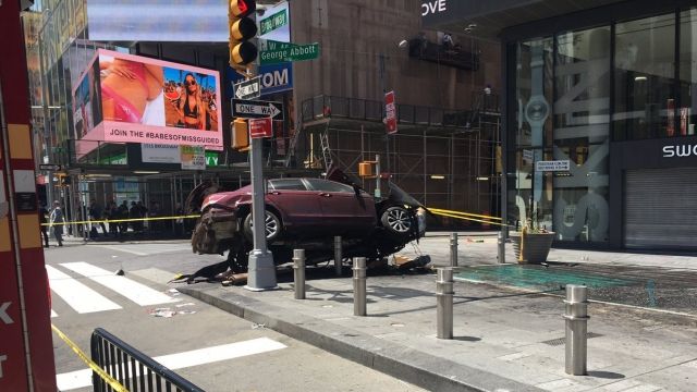 At least one person is dead and more than a dozen others injured after a car plowed into pedestrians in Times Square.