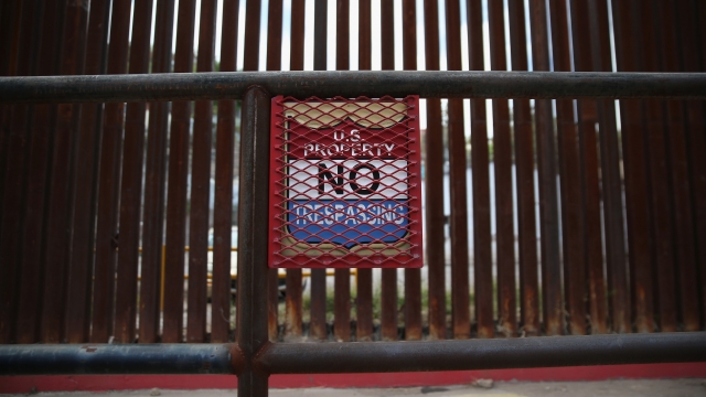 A sign hangs on the U.S.-Mexico border