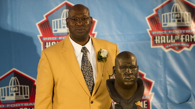 Cortez Kennedy with his Hall of Fame bust.