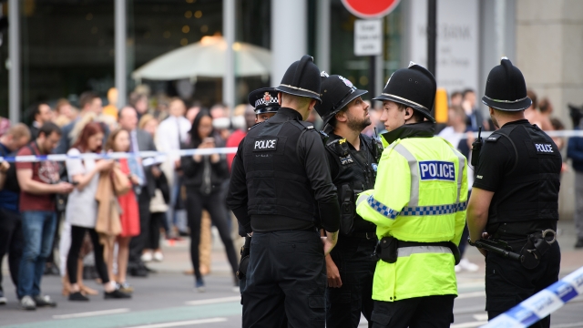 Police in Manchester, England, after a bombing at Manchester Arena killed 22 people.