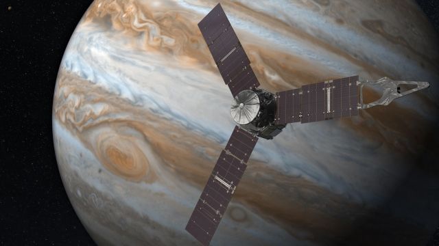 Juno spacecraft flying by Jupiter
