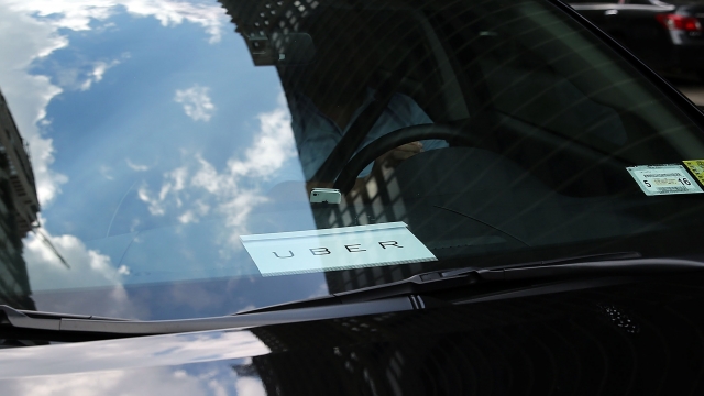 An Uber vehicle is viewed in Manhattan.