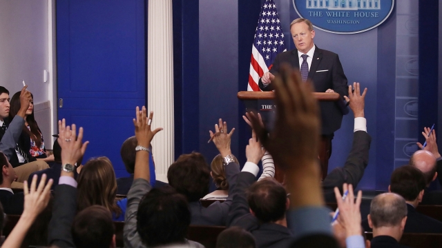 Sean Spicer calls on reporters during a White House press briefing.