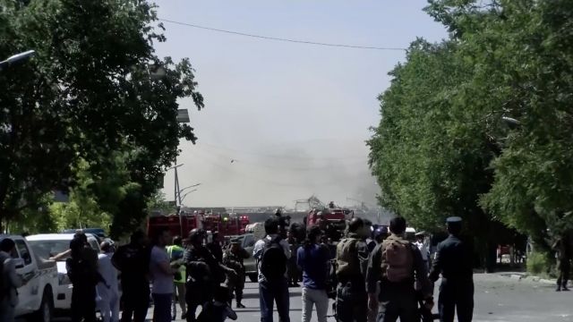 People at bomb blast site in Kabul, Afghanistan